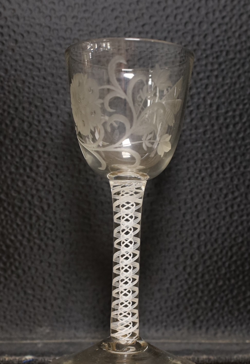 Three 18th century Jacobite type double series opaque twist stem wine glasses, 15cm tall
